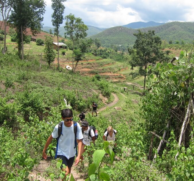 students-hiking-thailand-terraced-fields